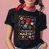 Black t-shirt featuring an embroidered-style design with the phrase "PUNCH NAZIS" in bold, colorful lettering. Above the text, a raised red fist is illustrated, symbolizing resistance, and is surrounded by a vibrant folk-art-inspired floral border with bright flowers, leaves, and geometric patterns in red, yellow, blue, and white.